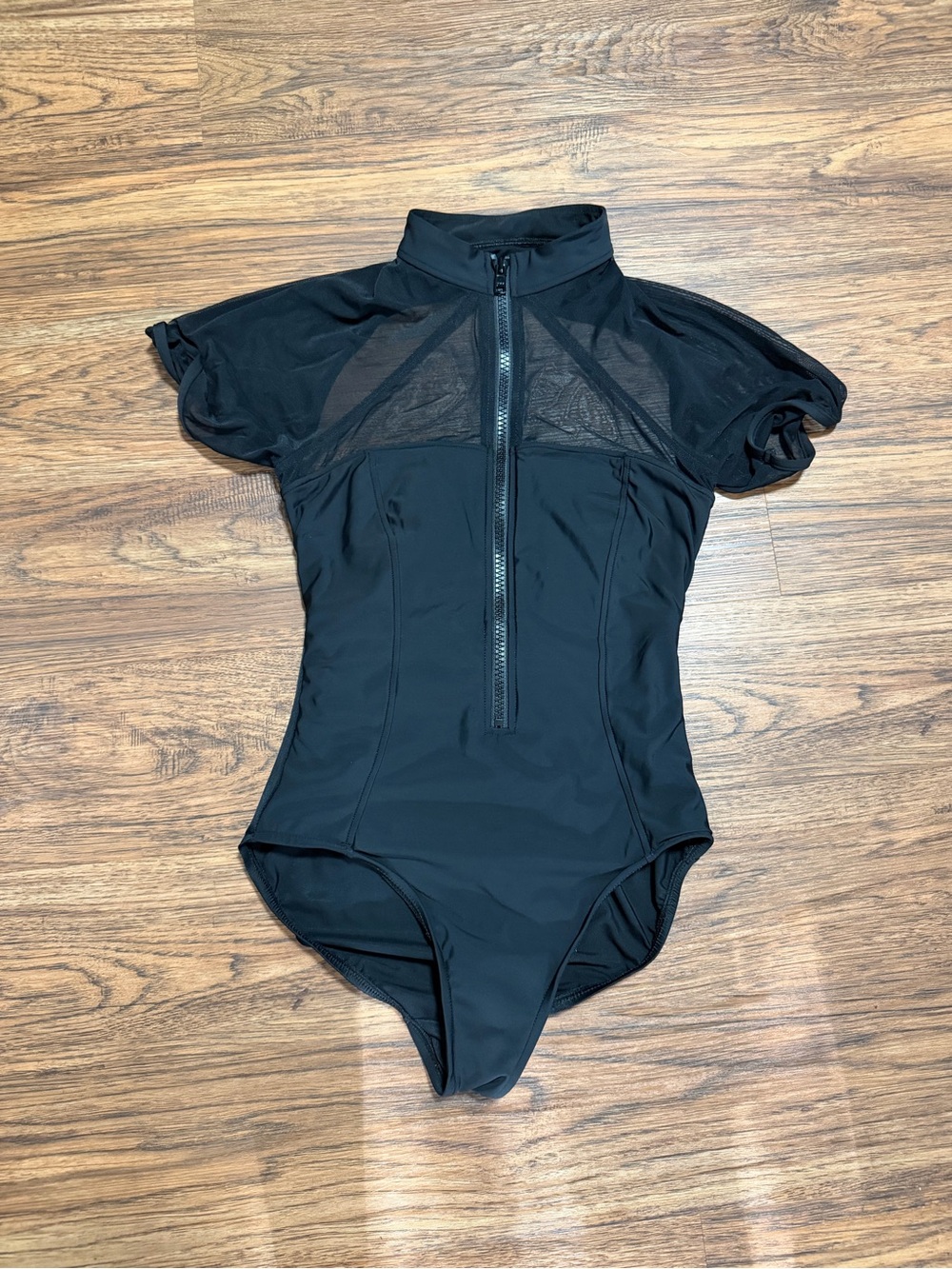 Magic Suit size small. Black Mesh-Panel Zip Front Bodysuit or swimsuit